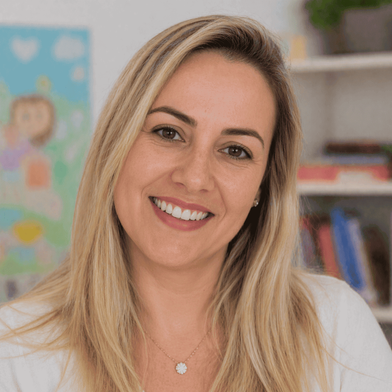 Cláudia M., professora